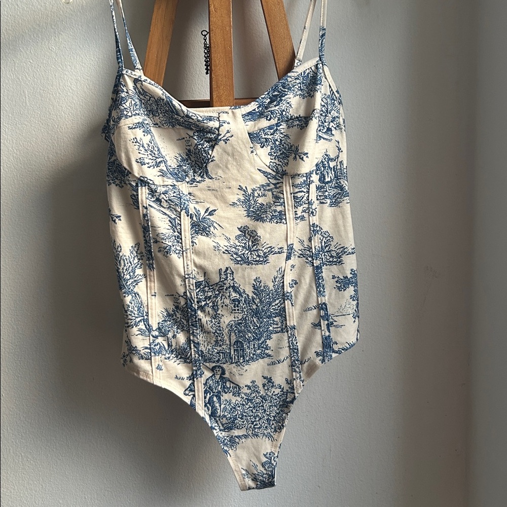 Toule indigo on antique white pattern bodysuit with 3 snaps